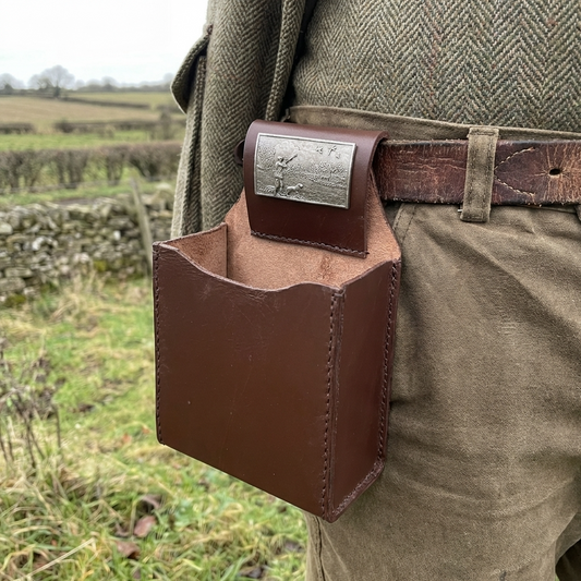 Leather cartridge Box holder with pewter shooting scene motif. attached to a shooters belt