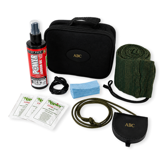 An air rifle cleaning and shooting gift set bundle on white background