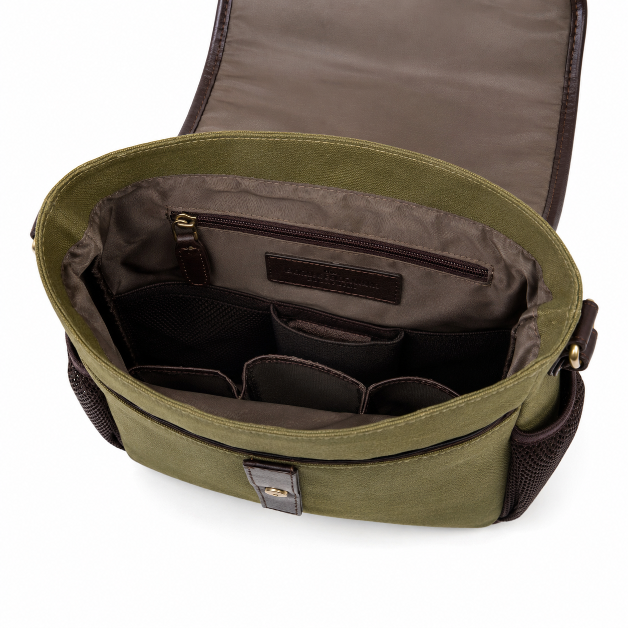 Inside of Green dog training bag with compartments on a white background