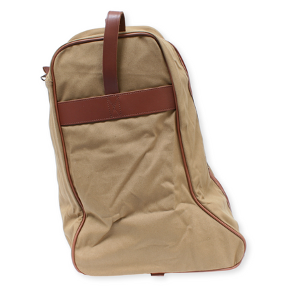 Beige backpack with brown leather straps on a white background