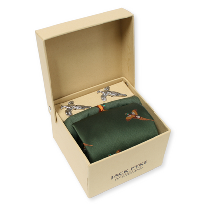 Green pocket square with pheasant design and silver cufflinks in a beige box.