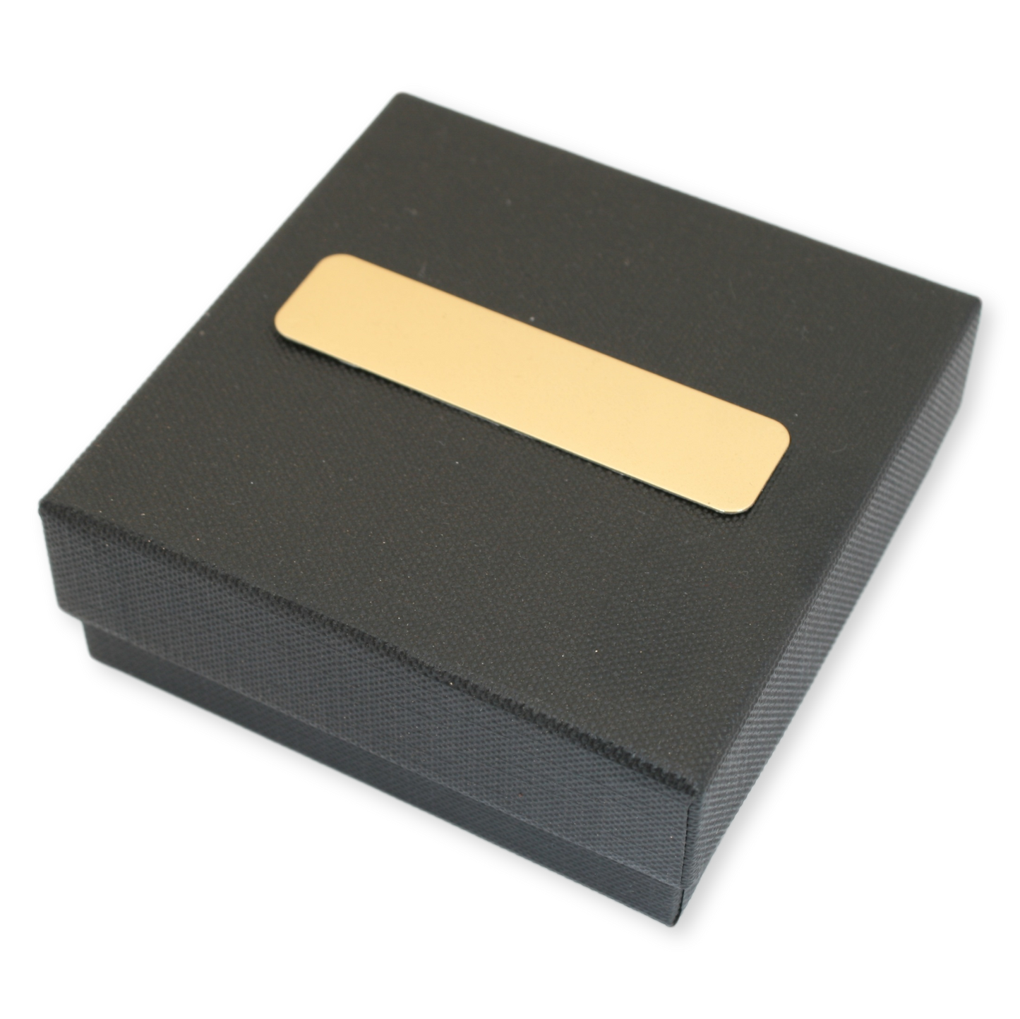 Black box with a gold label on a white background