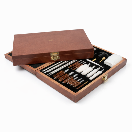 Personalised wooden gun cleaning kit with various tools on a white background