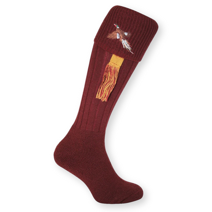 Maroon sock with pheasant design on a white background