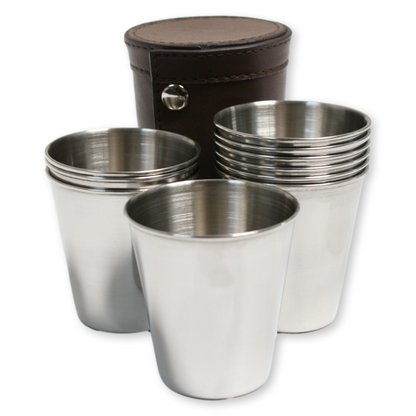 Set of stainless steel cups with a brown leather case on a white background