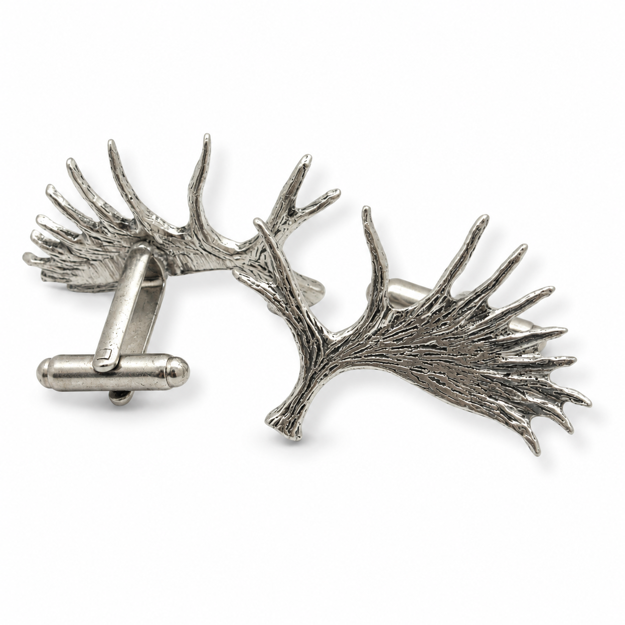 A pair of pewter cufflinks shaped like moose antlers with detailed textures, shown on a clean white background.