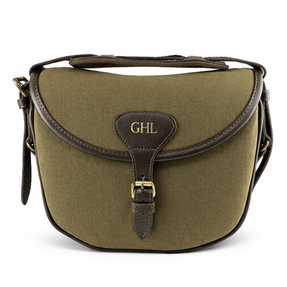 personalised green canvas cartridge bag on white from the front