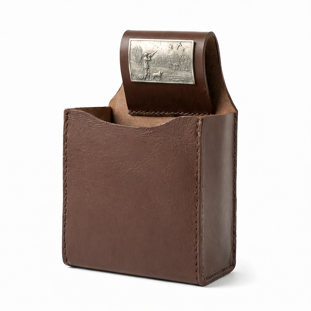 Leather cartridge Box holder with pewter shooting scene motif. on white background