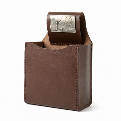 Leather cartridge Box holder with pewter shooting scene motif. on white background