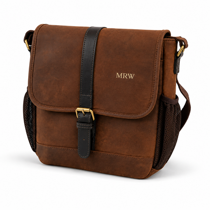 Brown nubuck leather dog training bag with 'MRW' monogram on a white background