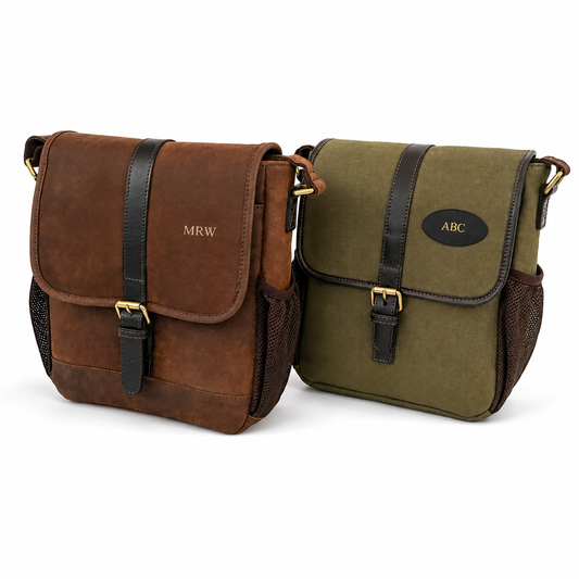 two dog training bags with initials embossed on white background