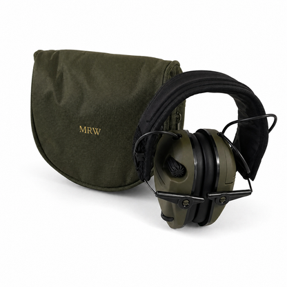 Green ear protection headphones with a matching carrying case on a white background