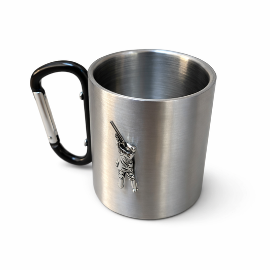 Stainless steel mug with black carabiner handle and game shooter emblem on a white background