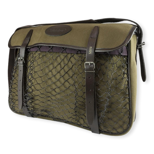 Green game bag with netting and brown straps on a white background