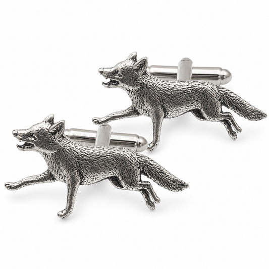 A pair of pewter cufflinks shaped like foxs with detailed textures, shown on a clean white background.