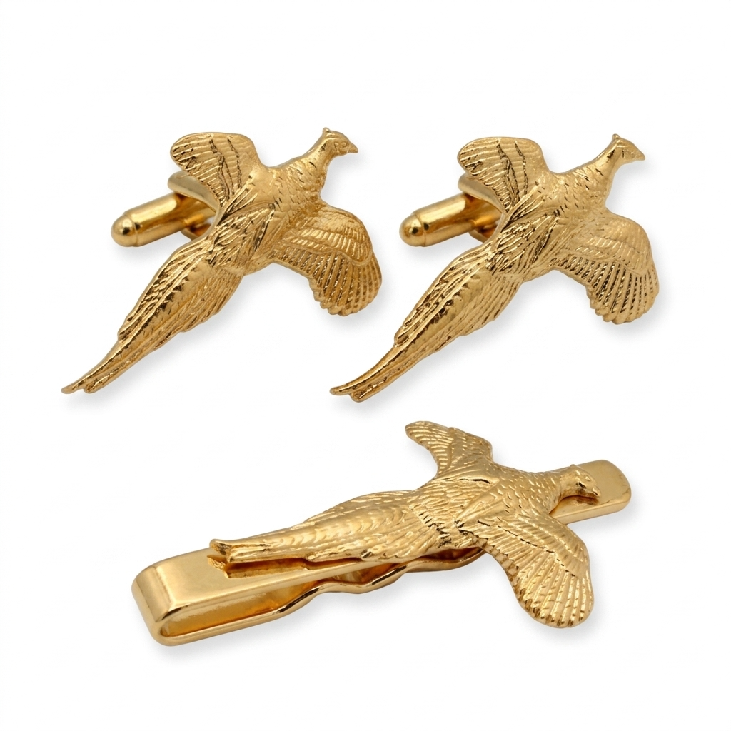 Three-piece gold plated men's accessory set featuring two matching pheasant cufflinks and one matching pheasant tie clip, shown on a plain white background.