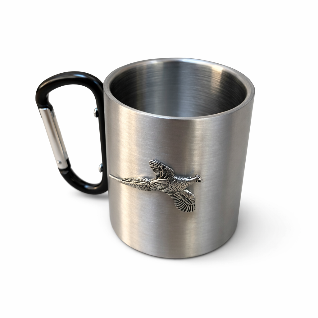Stainless steel mug with black carabiner handle and pheasant emblem on a white background