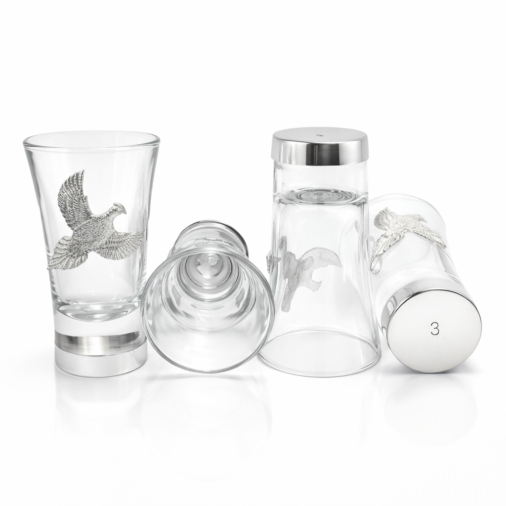 Pheasant shot glasses with numbered bases showing on white background