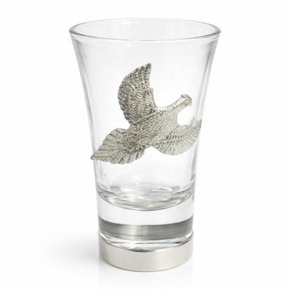 One pheasant shot glass standing up on white