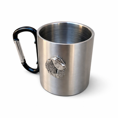Stainless steel mug with black carabiner handle and spaniel emblem on a white background