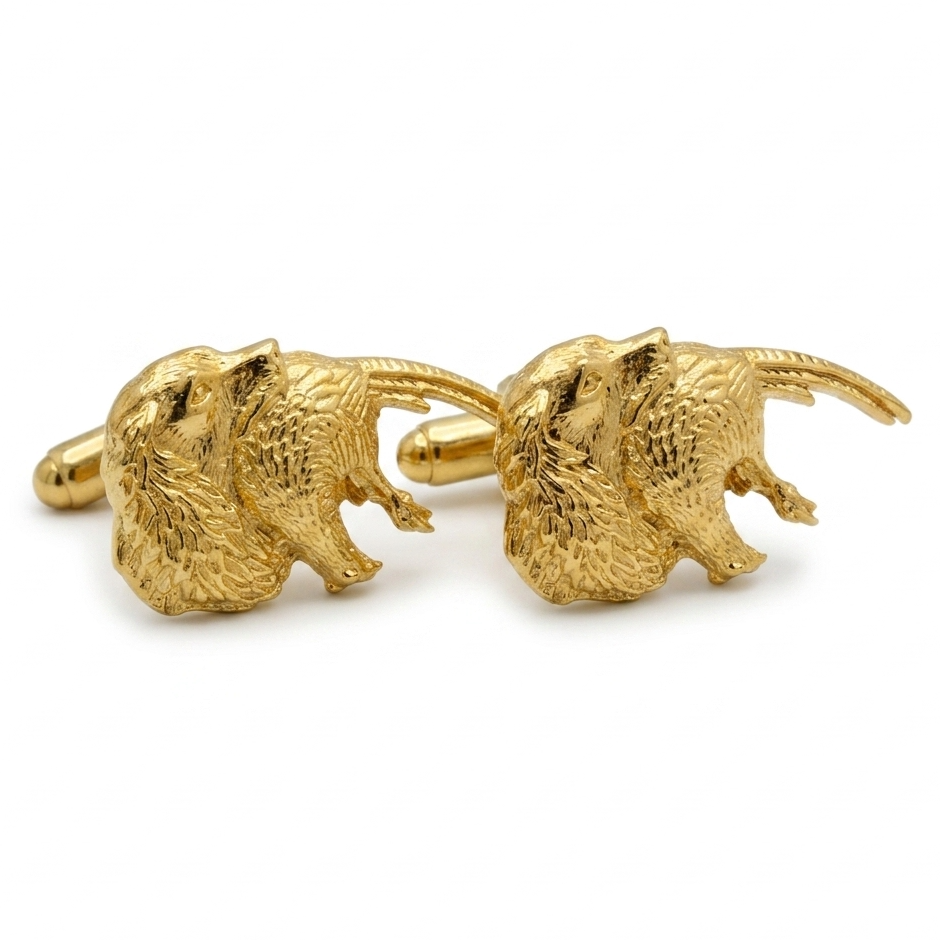 A pair of gold plated spaniel & Pheasant cufflinks with detailed textured fur, displayed on a clean white background.